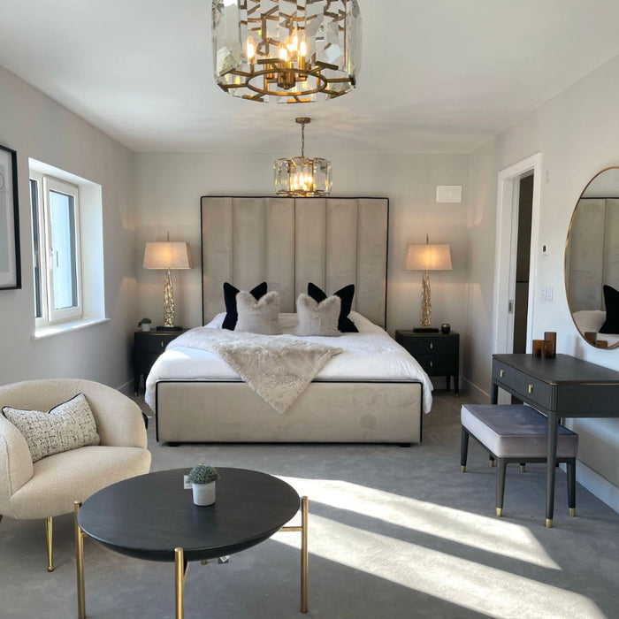 Custom Belle bed & frame with a tall, paneled upholstered headboard in a neutral, luxurious bedroom.